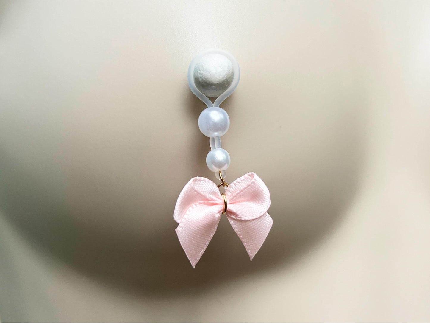 nipple noose jewelry with pearl beads and pink bow, cute nipple piercing with white pearls and light pink fabric bow