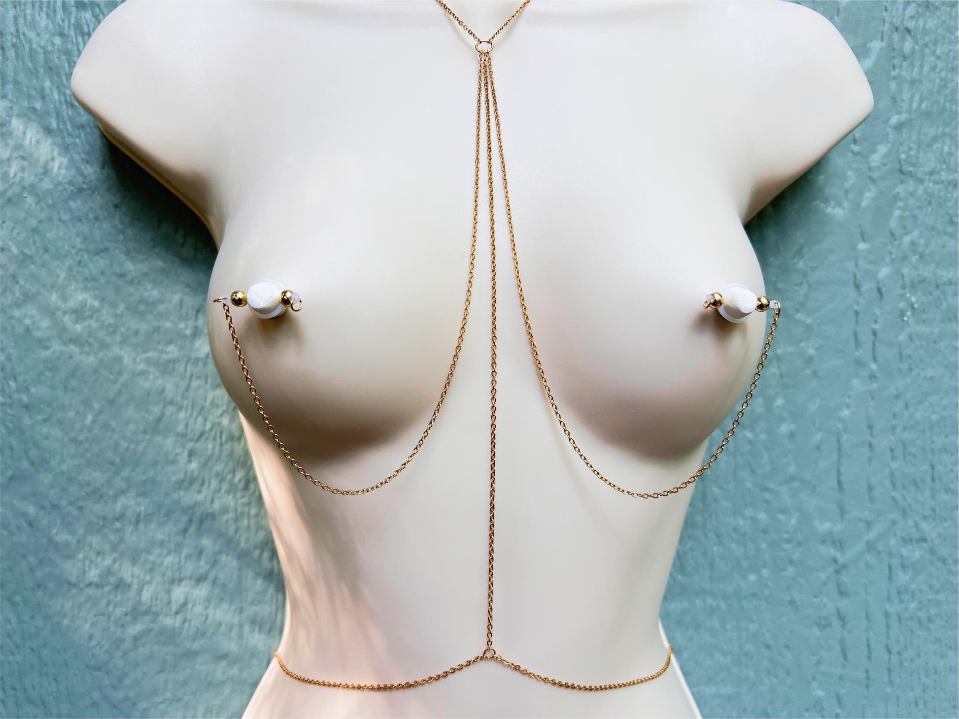 body chain with nipple piercings, body harness, gold breast harness with choker and nipple piercing attachment, nipple noose piercing, barbell nipple jewelry with body chain
