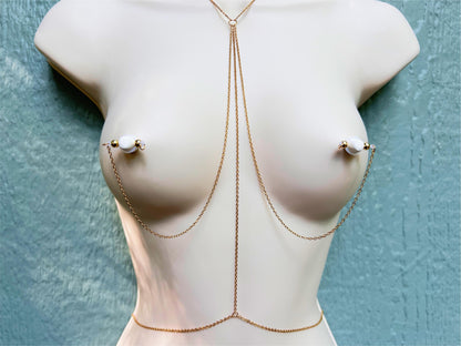 body chain with nipple piercings, body harness, gold breast harness with choker and nipple piercing attachment, nipple noose piercing, barbell nipple jewelry with body chain