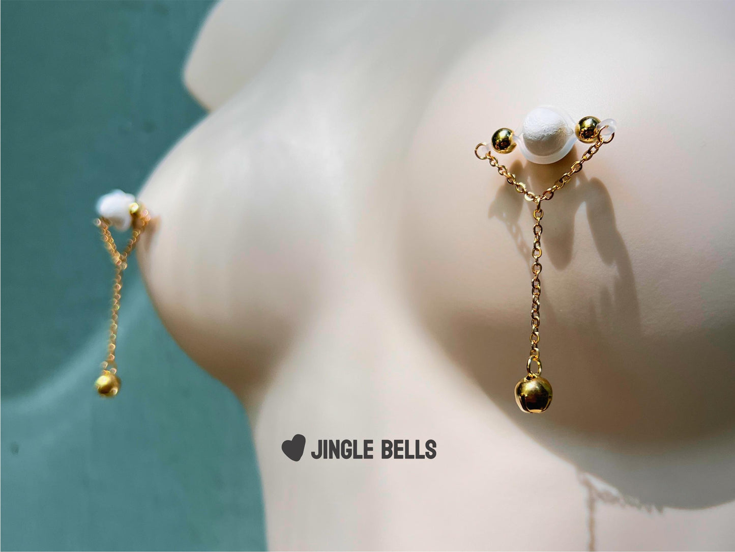 barbell style nipple piercing with jingle bell, gold nipple jewelry with bell