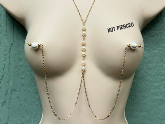 gold body chain with white pearls in center, dainty breast harness with pearls and fake nipple piercing, barbell nipple jewelry